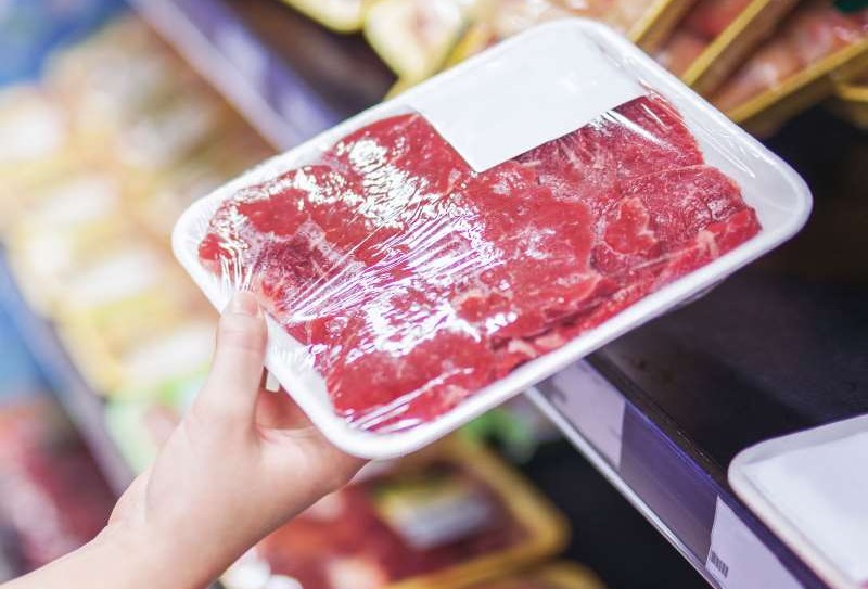 UV barrier for thin transparent food packaging