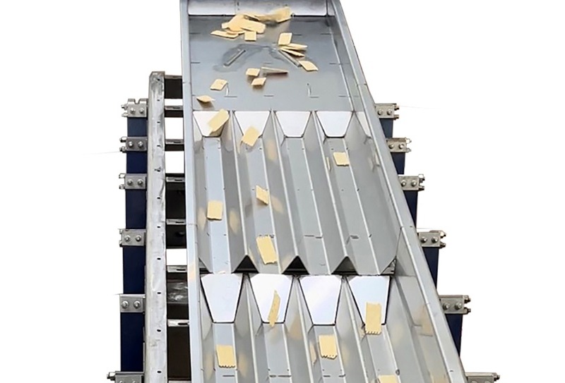 Vibratory conveying systems made for robotic pick-and-place