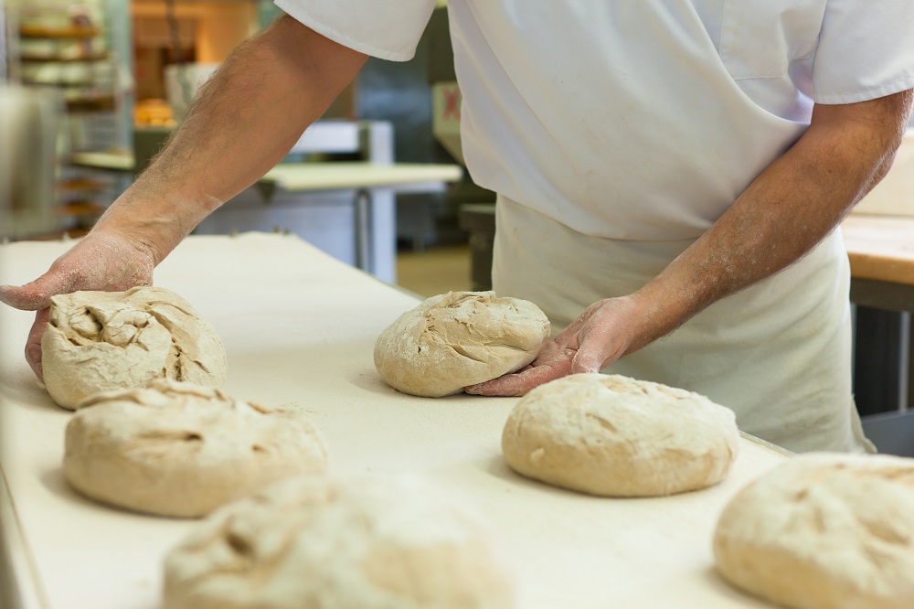 Baker with Fresh Bread Dough - Copy.jpg