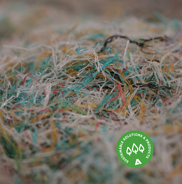 PHO_Fiber_after cleaning process_net waste with stamp sustainable.png