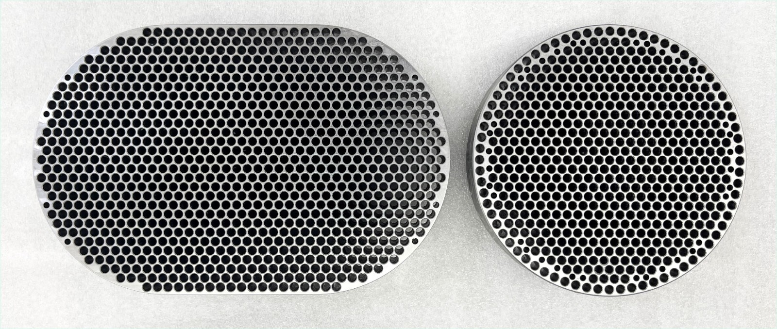 Oval and standard breaker plate.jpg
